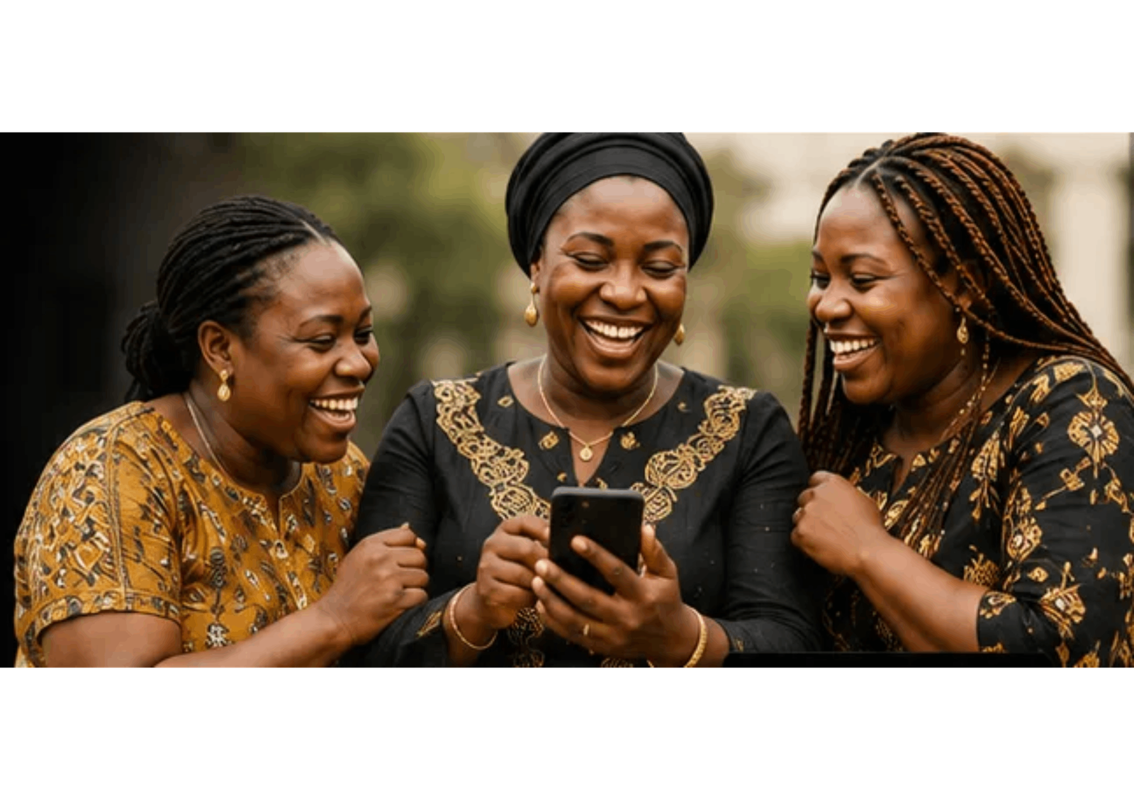 Three smiling women in traditional Ghanaian attire checking their susu savings group on a phone